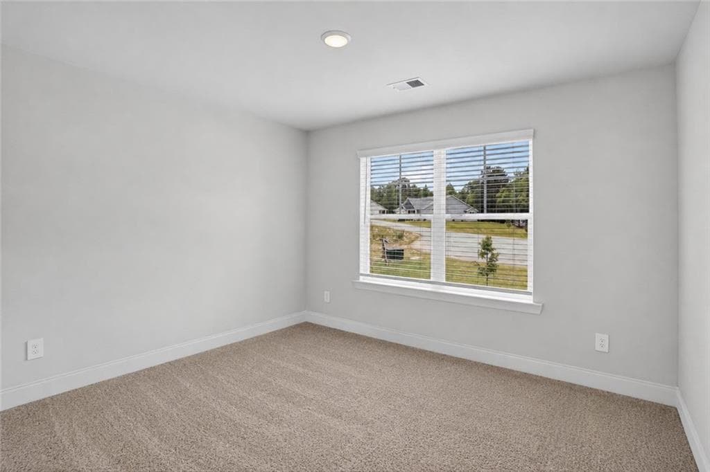 4 bedroom, 3 bathroom, 2,443 sq ft single family residence for sale at 5090 Tower View Trail, Snellville, GA 30039 — photo 4