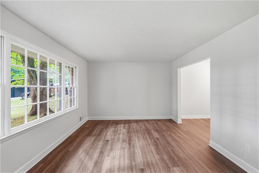 4 bedroom, 2 bathroom, 1,967 sq ft single family residence for sale at 7052 Lodgepole Drive, Morrow, GA 30260 — photo 3