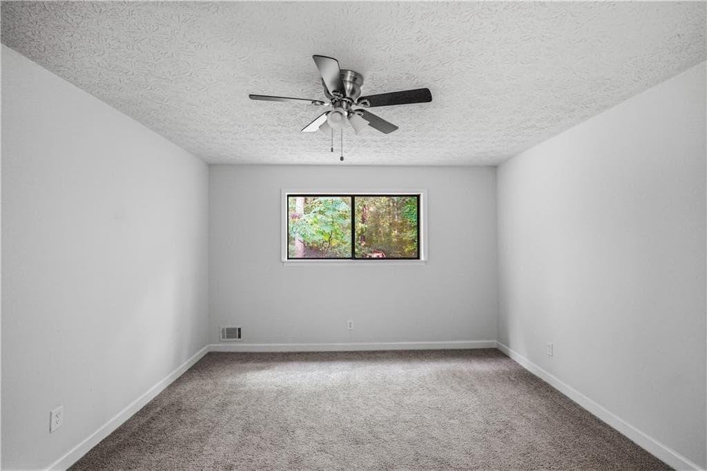 4 bedroom, 2 bathroom, 1,967 sq ft single family residence for sale at 7052 Lodgepole Drive, Morrow, GA 30260 — photo 4