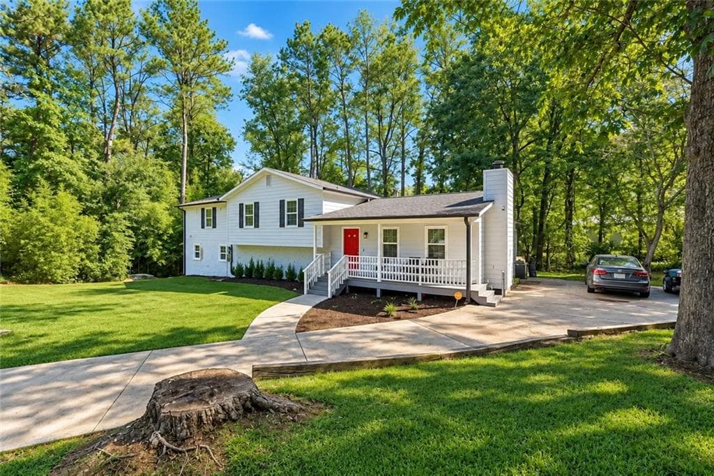 4 bedroom, 3 bathroom, 2,904 sq ft single family residence for sale at 5671 Tracy Drive, Mableton, GA 30126 — photo 2