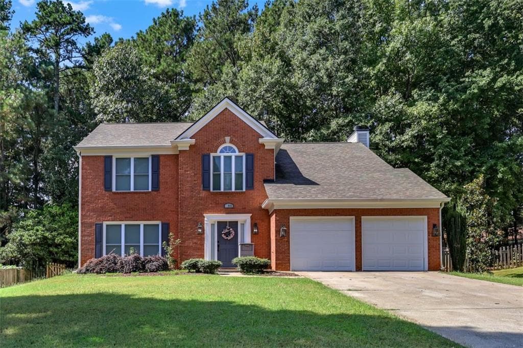 4 bedroom, 3 bathroom, 2,232 sq ft single family residence for sale at 1934 Mclennon Court, Lawrenceville, GA 30043 — photo 2