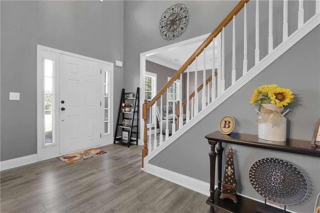 6 bedroom, 3 bathroom, 3,193 sq ft single family residence for sale at 4207 Reynolds Place, Buford, GA 30518 — photo 4