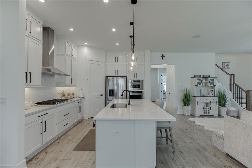 5 bedroom, 5 bathroom, 3,485 sq ft single family residence for sale at 2570 Bertrand Way, Cumming, GA 30041 — photo 3