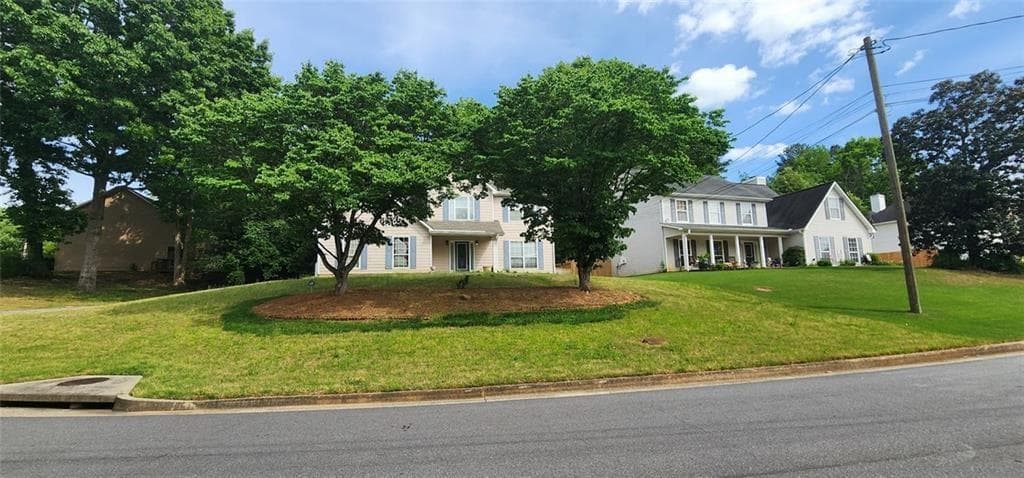 4 bedroom, 3 bathroom, 2,303 sq ft single family residence for sale at 2100 Springer Walk, Lawrenceville, GA 30043 — photo 2