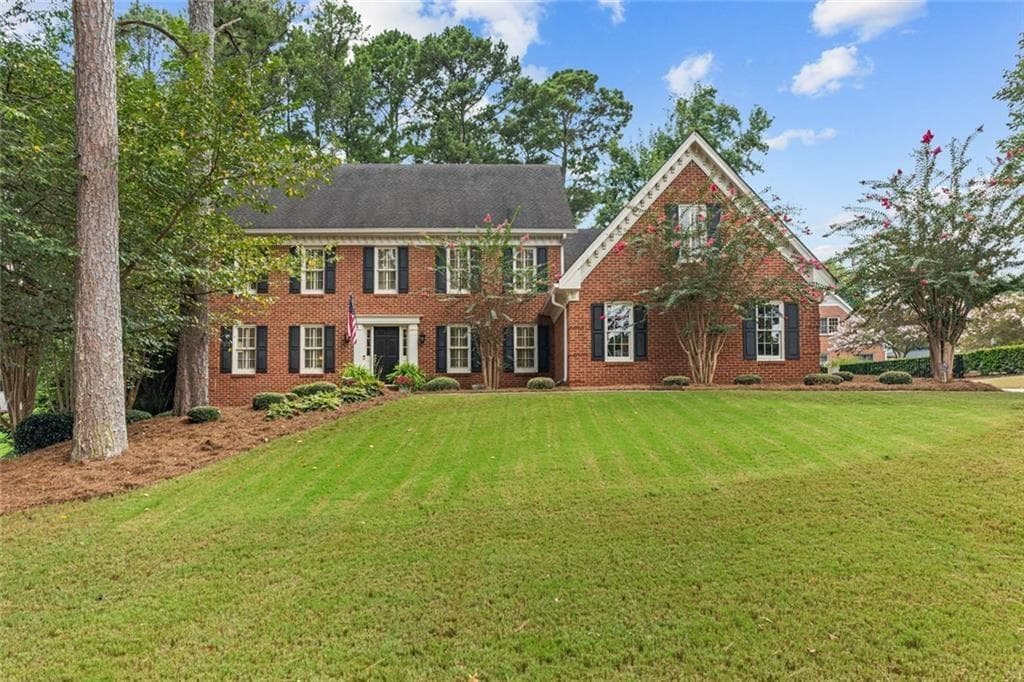 4 bedroom, 3 bathroom, 5,429 sq ft single family residence for sale at 877 Guinevere Way, Lilburn, GA 30047