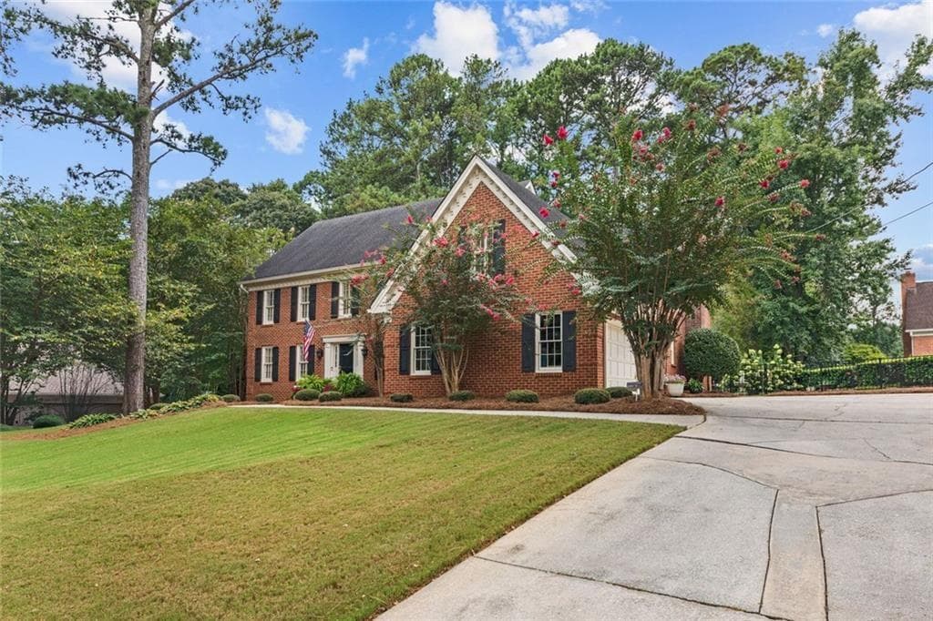 4 bedroom, 3 bathroom, 5,429 sq ft single family residence for sale at 877 Guinevere Way, Lilburn, GA 30047 — photo 2
