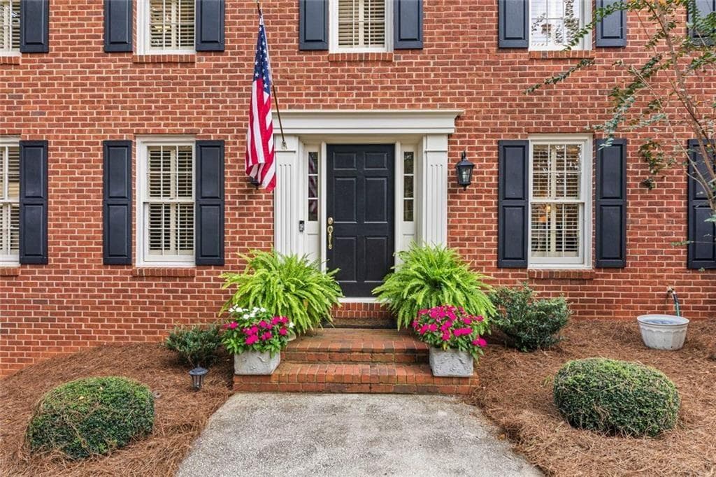 4 bedroom, 3 bathroom, 5,429 sq ft single family residence for sale at 877 Guinevere Way, Lilburn, GA 30047 — photo 3