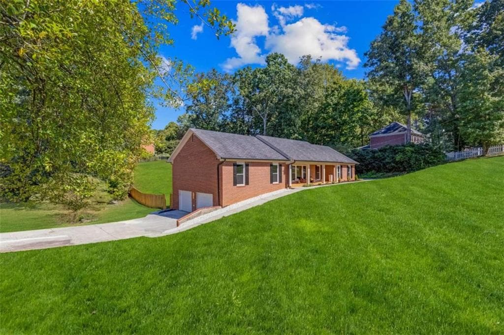 4 bedroom, 4 bathroom, 3,066 sq ft single family residence for sale at 3354 S Scales Road, Suwanee, GA 30024 — photo 2