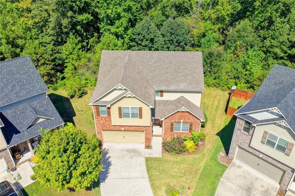 5 bedroom, 3 bathroom, 2,423 sq ft single family residence for sale at 1366 Castleberry Drive, Buford, GA 30518 — photo 4