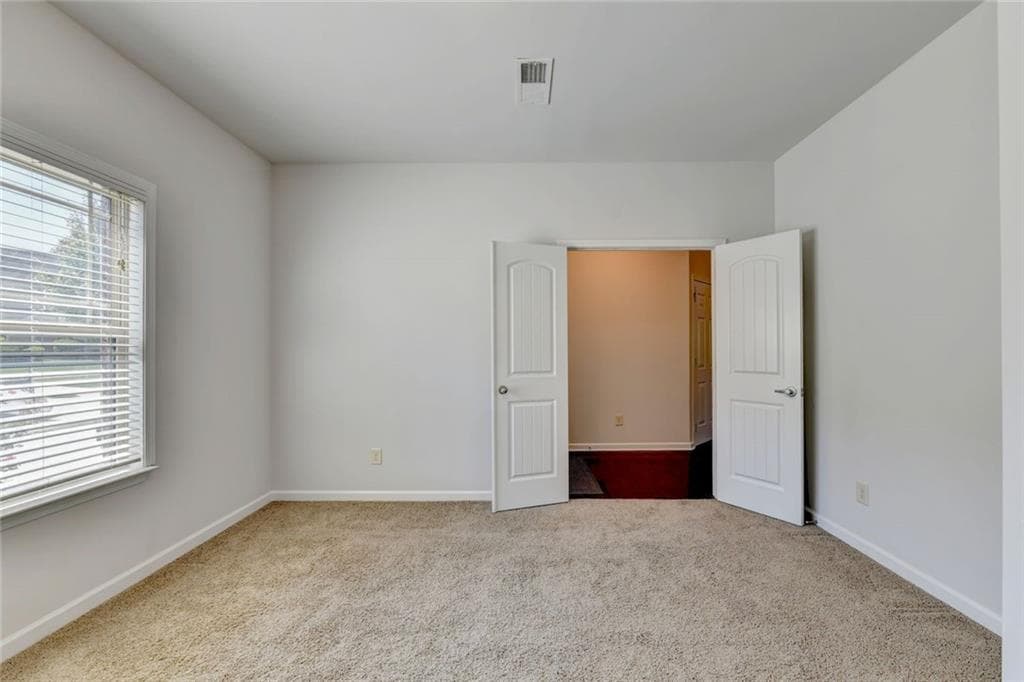 5 bedroom, 3 bathroom, 2,423 sq ft single family residence for sale at 1366 Castleberry Drive, Buford, GA 30518 — photo 9