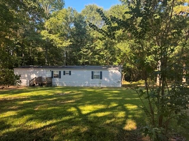 3 bedroom, 2 bathroom, 1,152 sq ft single family residence under contract at 1065 Puckett Road, Auburn, GA 30011 — photo 3