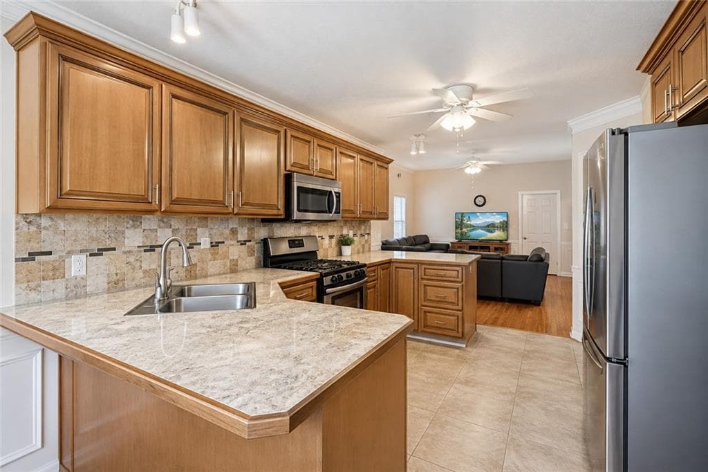 5 bedroom, 3 bathroom, 2,419 sq ft single family residence for sale at 740 Pebble Boulevard, Covington, GA 30016 — photo 4