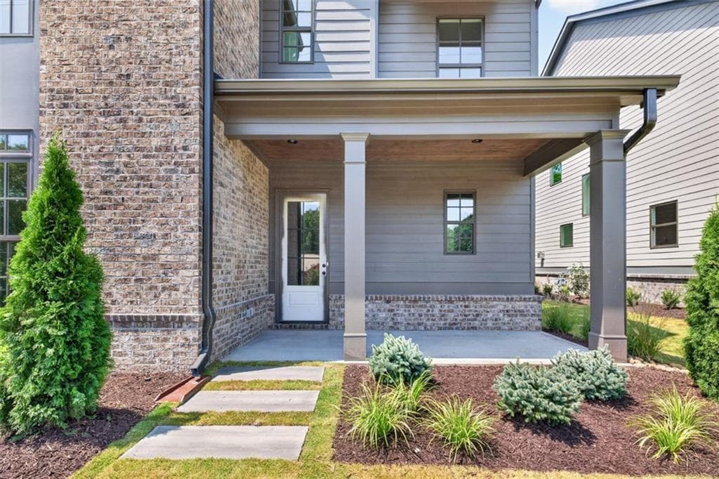 4 bedroom, 4 bathroom, 2,895 sq ft single family residence for sale at 5812 Mitchell Street, Flowery Branch, GA 30542 — photo 2