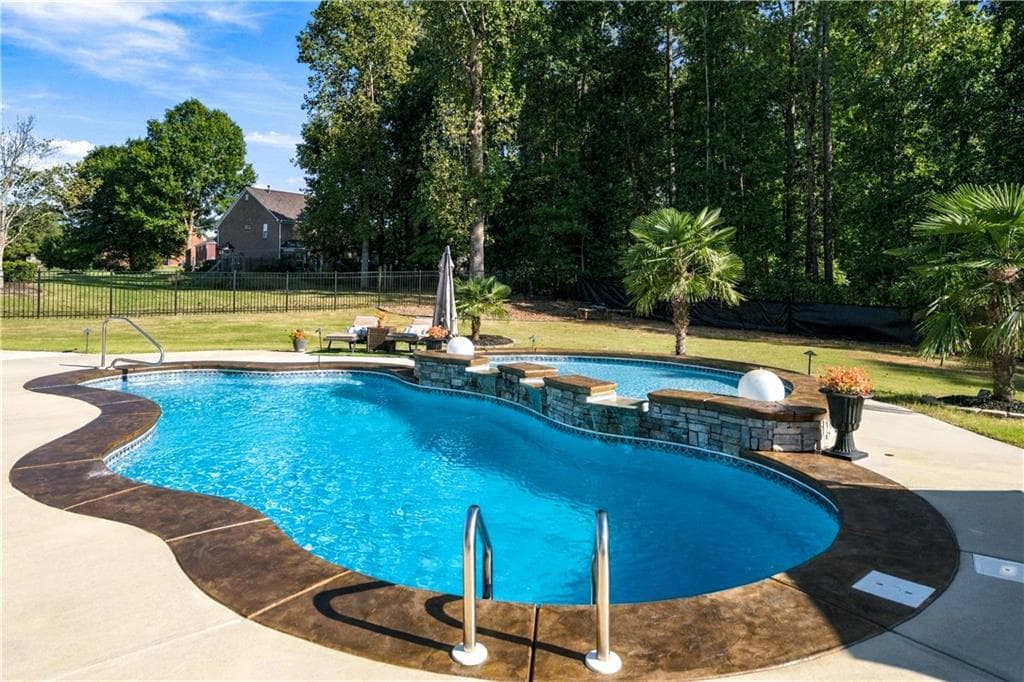5 bedroom, 4 bathroom, 4,651 sq ft single family residence for sale at 4031 Rotterdam Pass, Hampton, GA 30228 — photo 8