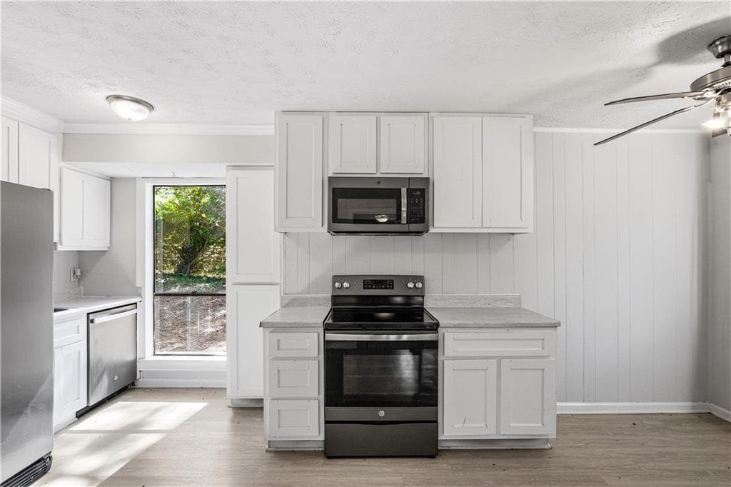 3 bedroom, 2 bathroom, 1,100 sq ft single family residence for sale at 71 Bethesda Church Road, Lawrenceville, GA 30044 — photo 2