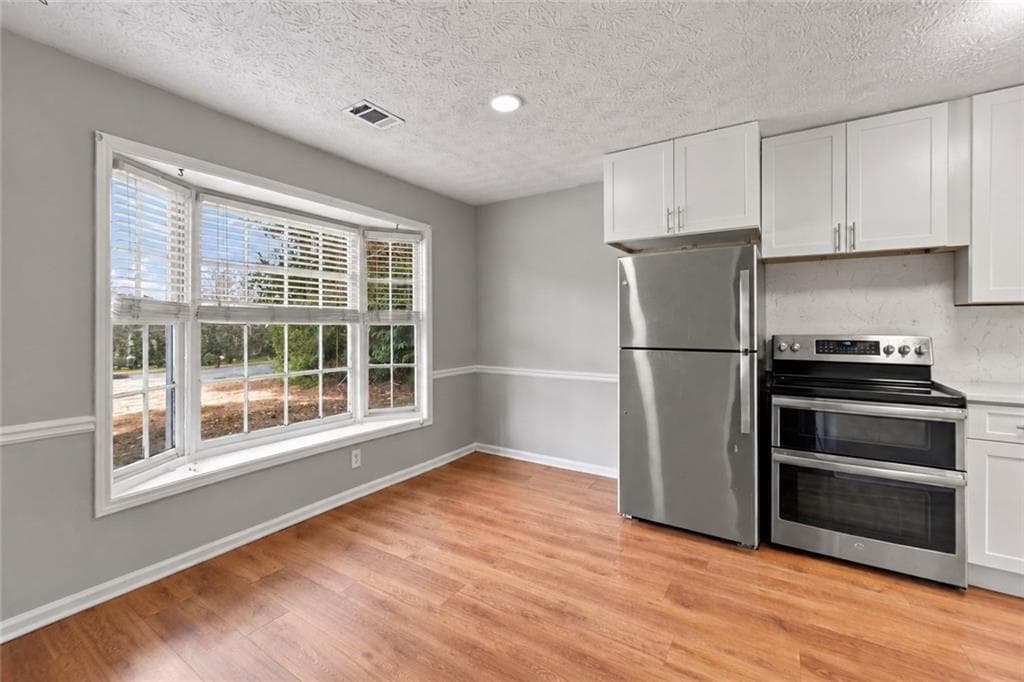 2 bedroom, 3 bathroom, 1,216 sq ft townhouse for sale at 1867 Mcelvaney Lane, Lawrenceville, GA 30044 — photo 4