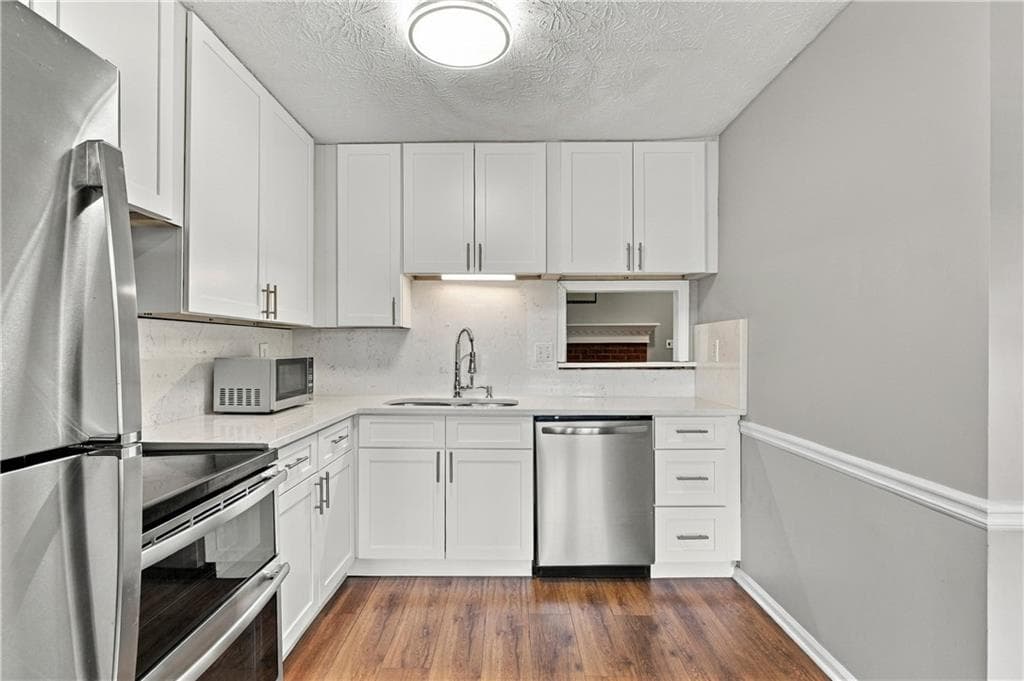 2 bedroom, 3 bathroom, 1,216 sq ft townhouse for sale at 1867 Mcelvaney Lane, Lawrenceville, GA 30044 — photo 7