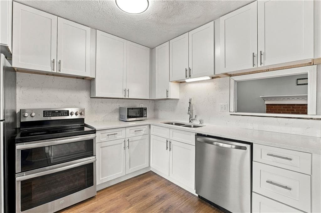 2 bedroom, 3 bathroom, 1,216 sq ft townhouse for sale at 1867 Mcelvaney Lane, Lawrenceville, GA 30044 — photo 8