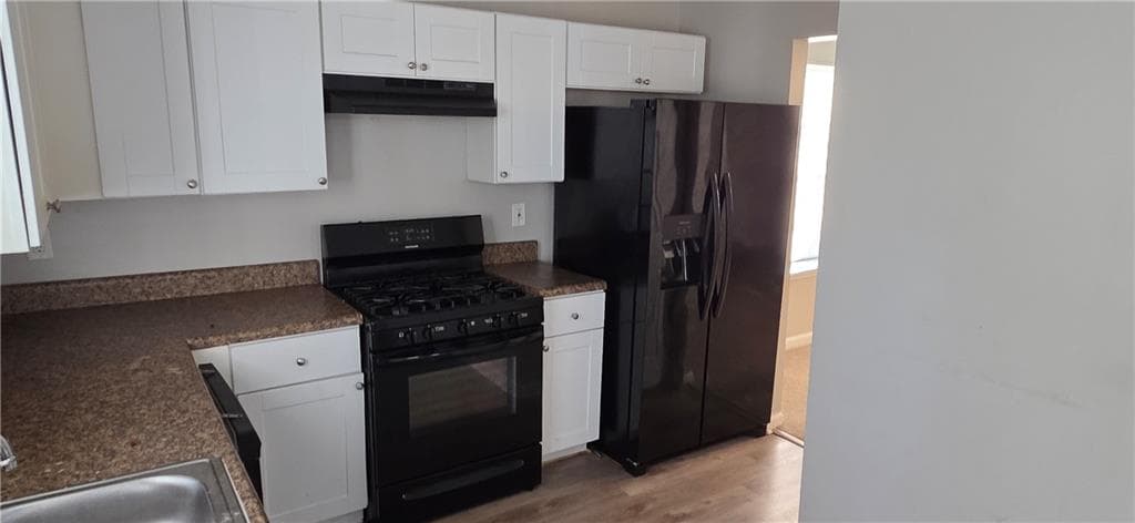 4 bedroom, 3 bathroom, 2,573 sq ft single family residence for sale at 6260 Phillips Lake Way, Lithonia, GA 30058 — photo 8