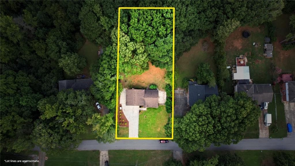 3 bedroom, 2 bathroom, 1,853 sq ft single family residence for sale at 1042 Duke Drive, Conyers, GA 30013 — photo 1 of 40
