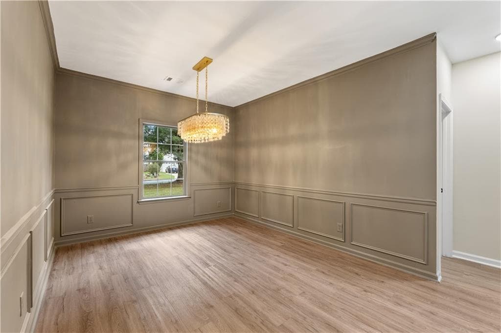 4 bedroom, 2 bathroom, 2,221 sq ft single family residence for sale at 5500 Arrowind Road, Lilburn, GA 30047 — photo 8