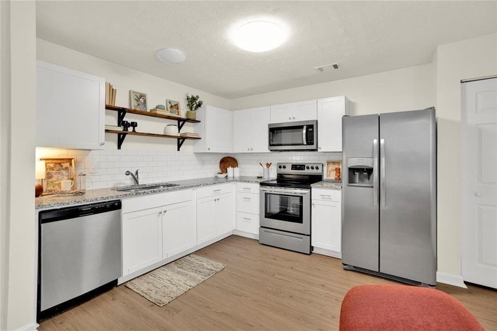 3 bedroom, 3 bathroom, 1,273 sq ft condominium for sale at 604 Ivey Court B, Woodstock, GA 30188 — photo 5