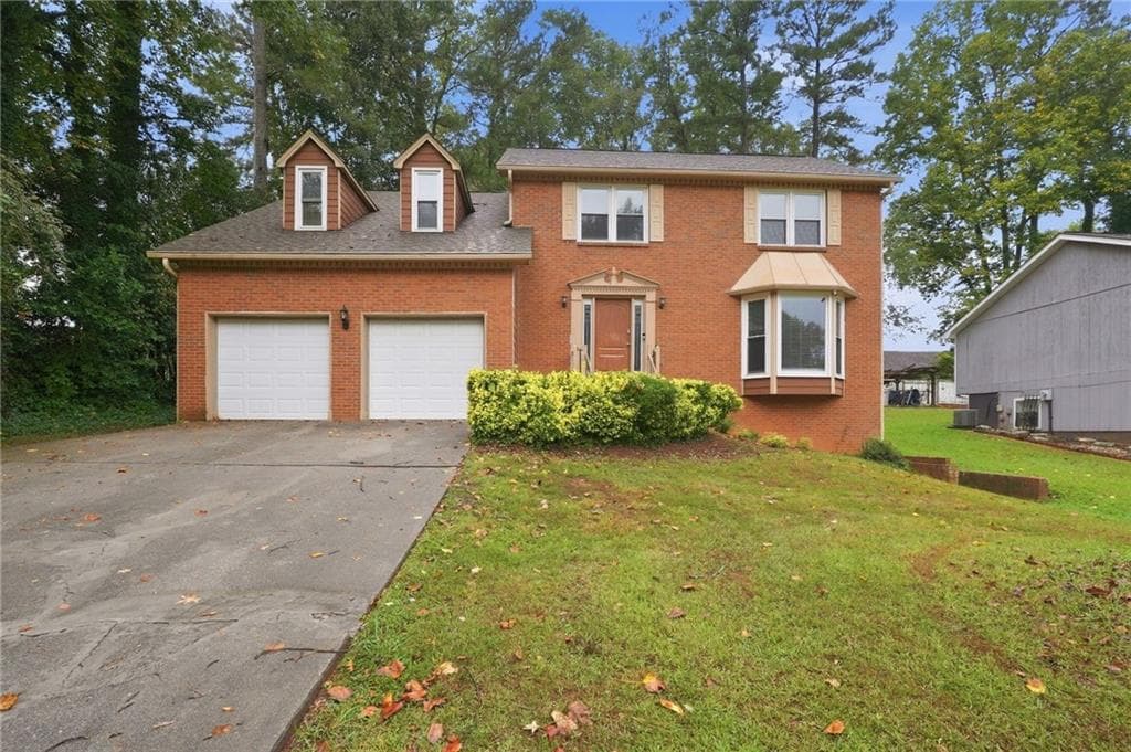 4 bedroom, 3 bathroom, 2,214 sq ft home for sale at 1547 Golf Link Drive, Stone Mountain, GA