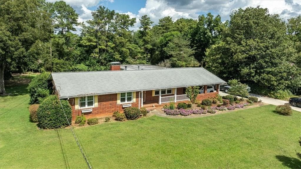 4 bedroom, 3 bathroom, 3,850 sq ft single family residence for sale at 580 Hurt Road, Smyrna, GA 30082 — photo 2