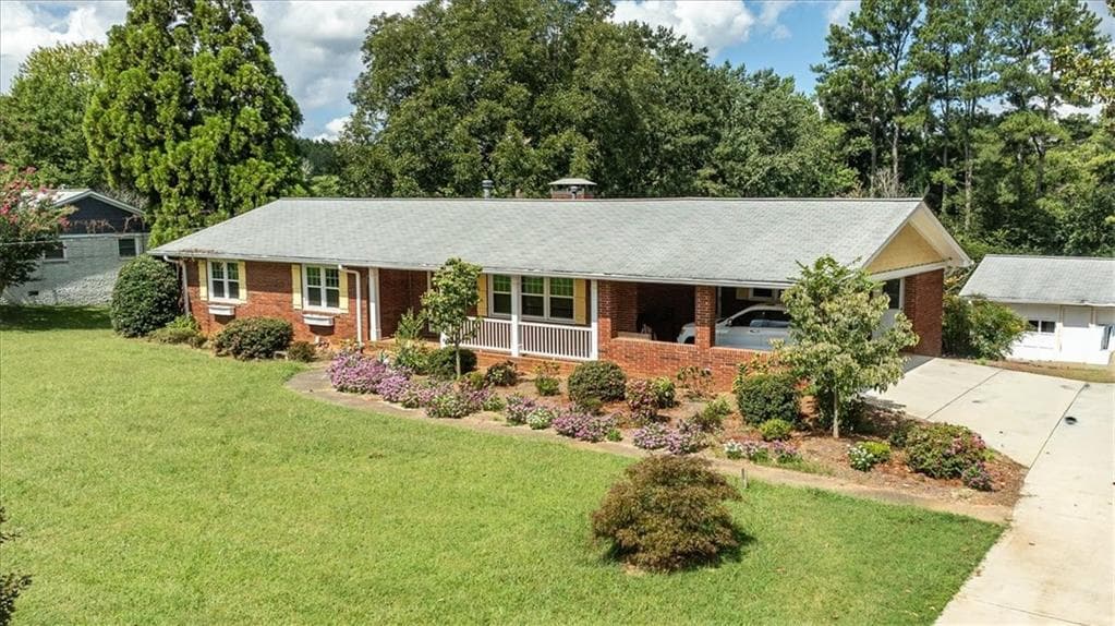 4 bedroom, 3 bathroom, 3,850 sq ft single family residence for sale at 580 Hurt Road, Smyrna, GA 30082 — photo 5