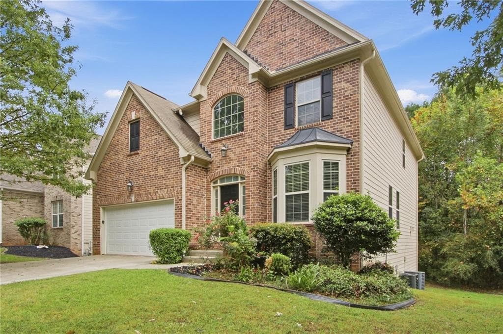 4 bedroom, 3 bathroom, 3,018 sq ft single family residence for sale at 4290 Rosehall Court, Atlanta, GA 30349 — photo 2