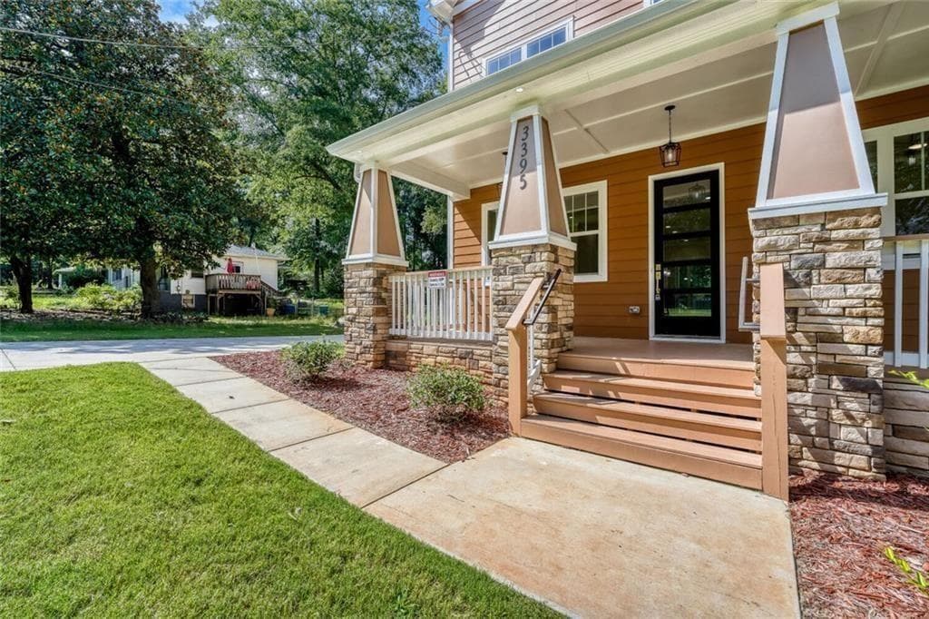 7 bedroom, 4 bathroom, 3,400 sq ft single family residence for sale at 3395 Lee Place, Atlanta, GA 30349 — photo 2