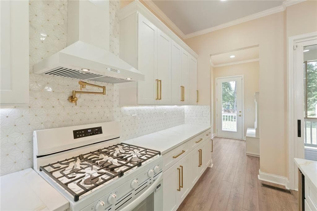 7 bedroom, 4 bathroom, 3,400 sq ft single family residence for sale at 3395 Lee Place, Atlanta, GA 30349 — photo 5