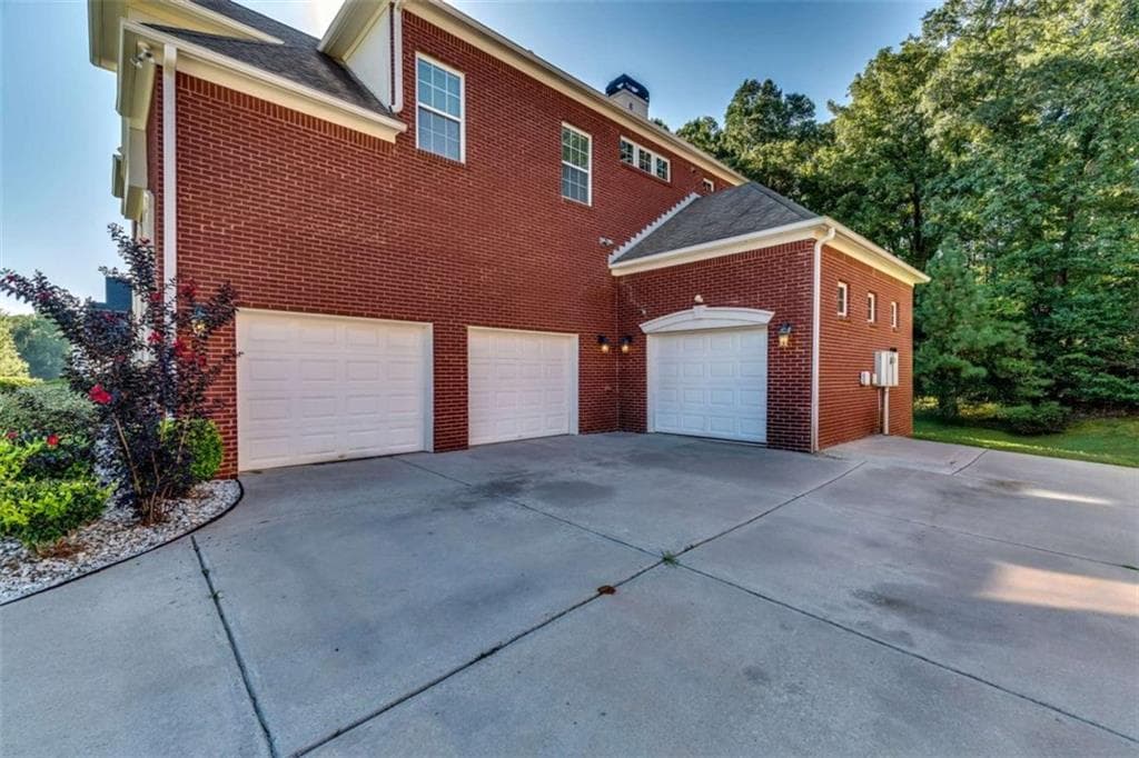6 bedroom, 5 bathroom, 6,920 sq ft single family residence for sale at 4473 River Vista Road, Ellenwood, GA 30294 — photo 4