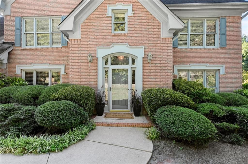 5 bedroom, 4 bathroom, 5,448 sq ft single family residence for sale at 3520 Lester Ct., Lilburn, GA 30047 — photo 2
