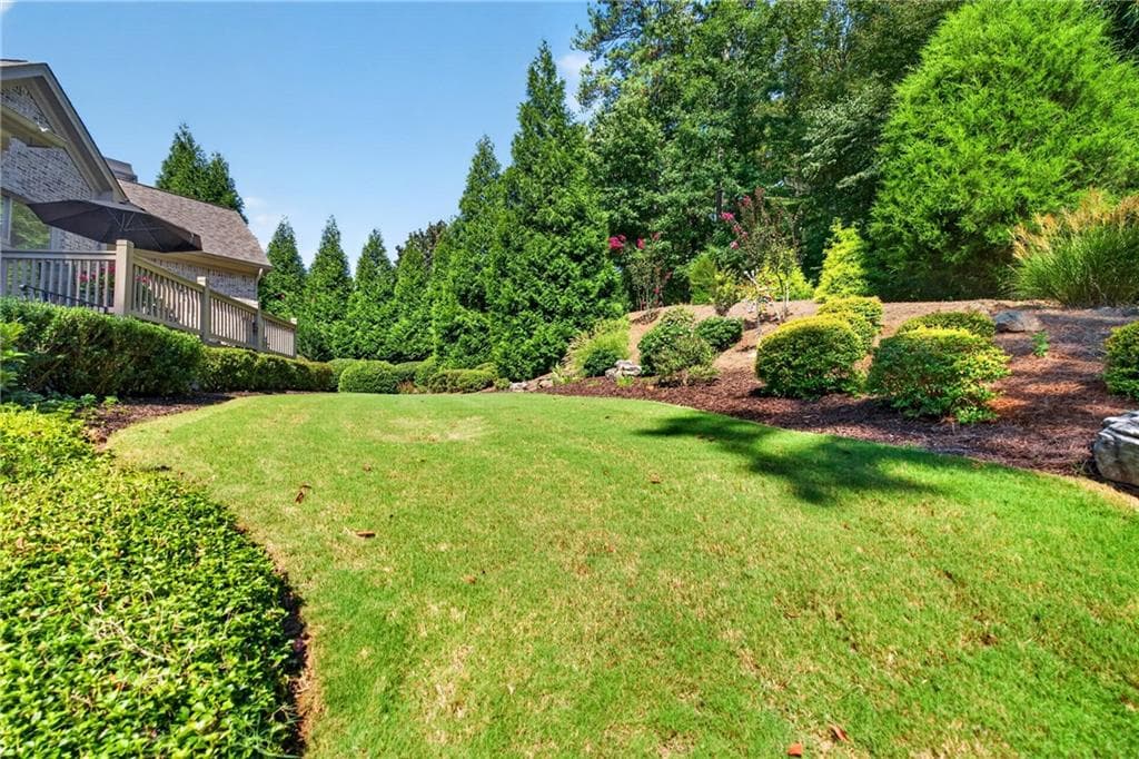 6 bedroom, 7 bathroom, 7,112 sq ft single family residence for sale at 750 Tramore Place, Milton, GA 30004 — photo 2