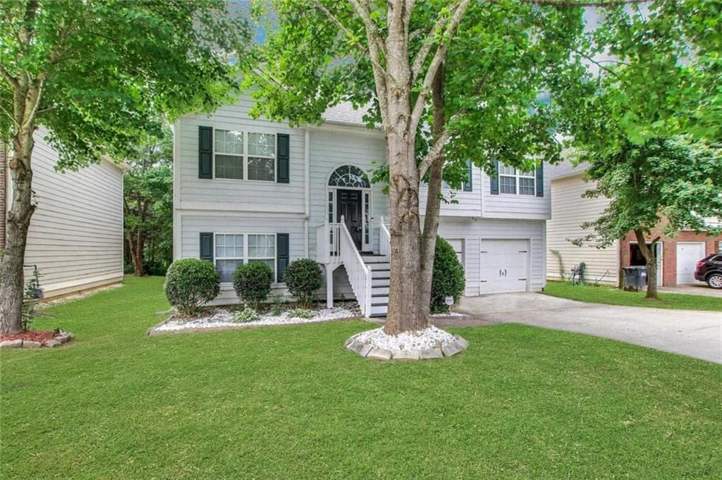 4 bedroom, 3 bathroom, 2,202 sq ft single family residence for rent at 1411 Cumberland Creek Lane, Marietta, GA 30008 for $2,495 a month — photo 2