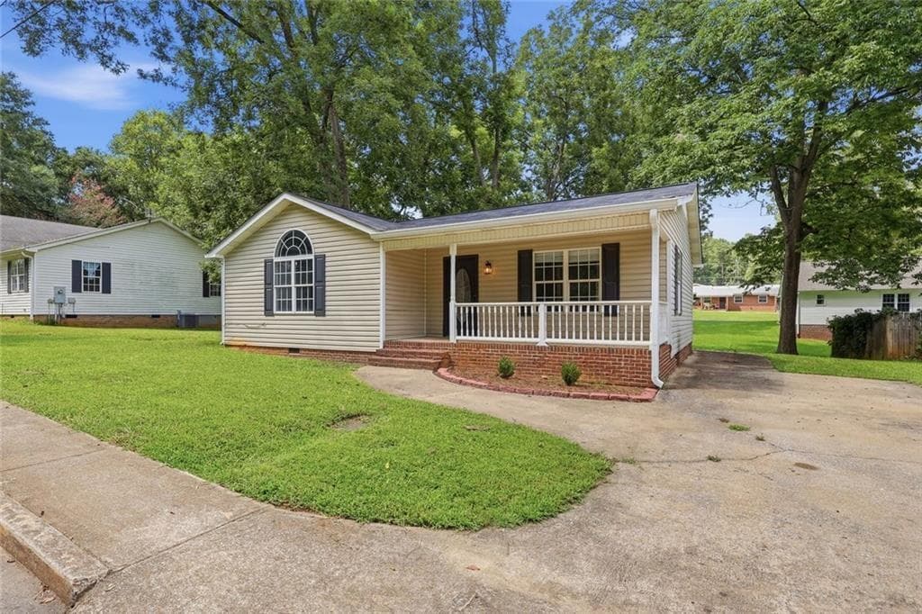 3 bedroom, 2 bathroom, 1,160 sq ft single family residence for sale at 100 Depot Street, Buchanan, GA 30113 — photo 2
