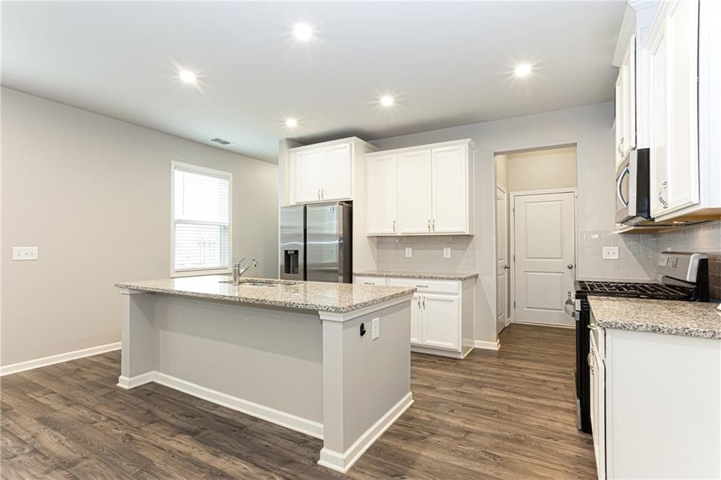 3 bedroom, 3 bathroom, 2,328 sq ft townhouse for sale at 6219 Centennial Run, Atlanta, GA 30349 — photo 7