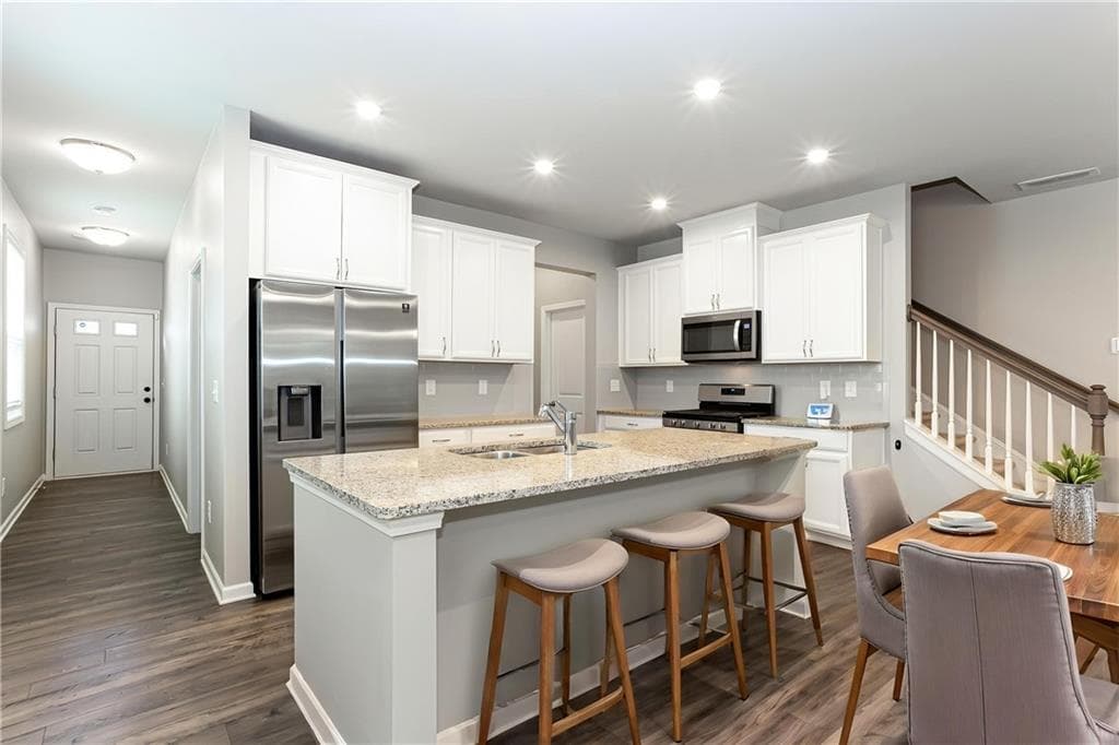 3 bedroom, 3 bathroom, 2,328 sq ft townhouse for sale at 6219 Centennial Run, Atlanta, GA 30349 — photo 8
