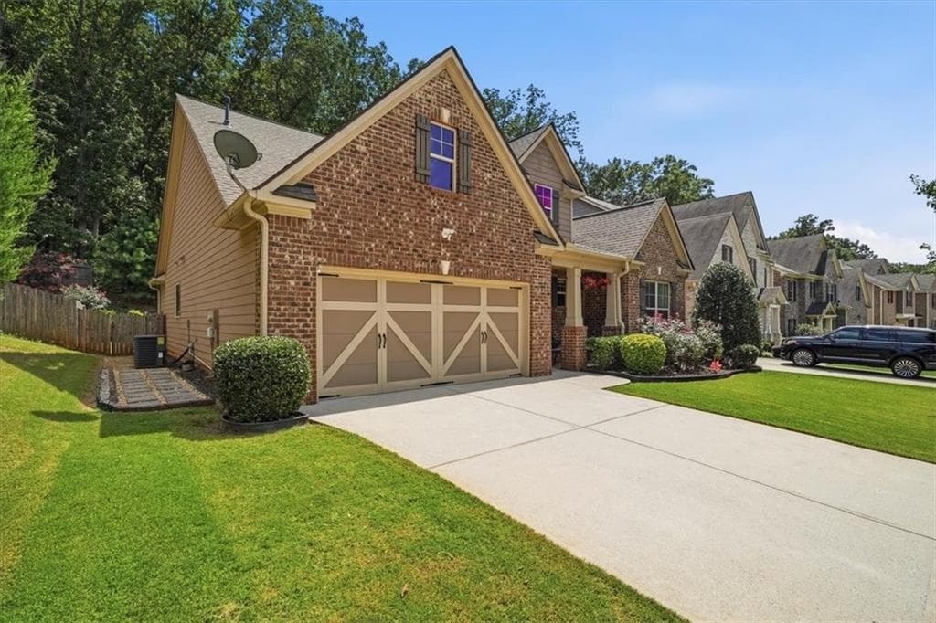 4 bedroom, 3 bathroom, 2,295 sq ft single family residence for sale at 2449 Beauchamp Court, Buford, GA 30519 — photo 4