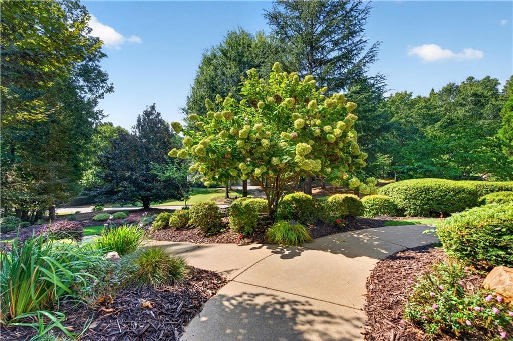 6 bedroom, 7 bathroom, 7,112 sq ft single family residence for sale at 750 Tramore Place, Milton, GA 30004 — photo 9