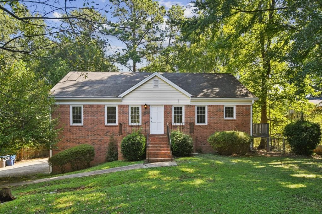4 bedroom, 2 bathroom, 2,304 sq ft single family residence for rent at 5659 Whispering Pines Road, Mableton, GA 30126 for $2,600 a month — photo 1 of 39