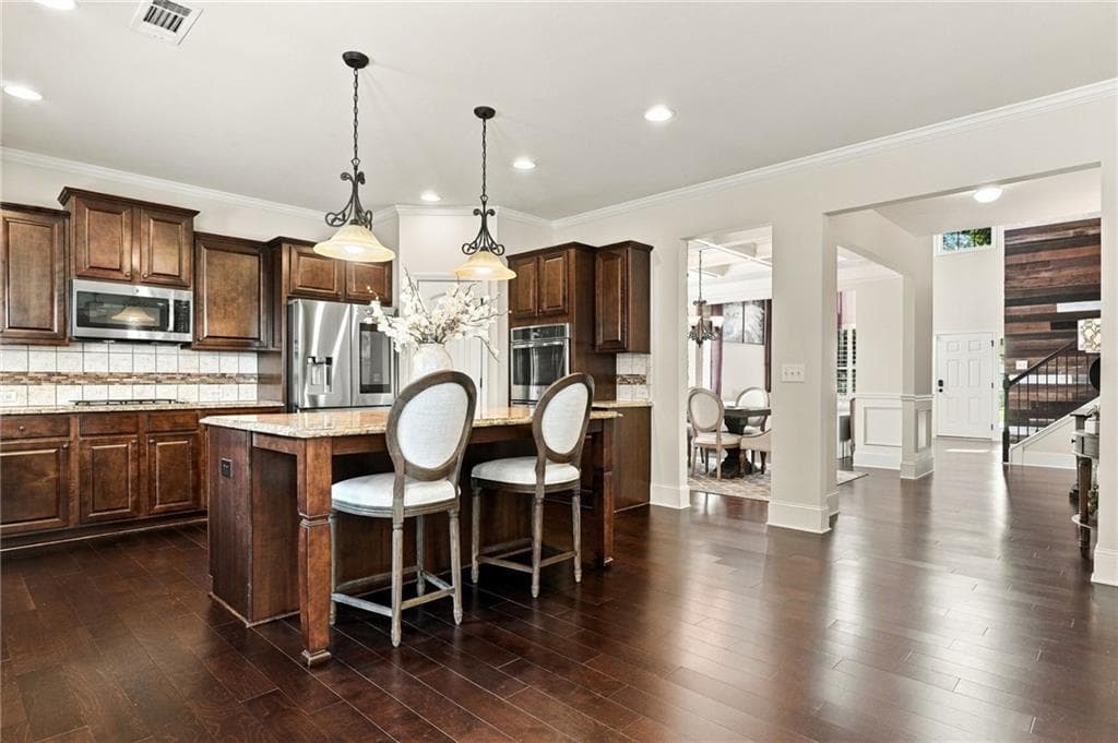 5 bedroom, 4 bathroom, 3,788 sq ft single family residence for sale at 5765 Willow Oak Pass, Cumming, GA 30040 — photo 8