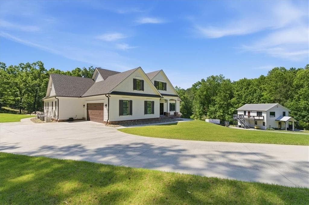 5 bedroom, 6 bathroom, 8,428 sq ft single family residence for sale at 395 Heard Road, Canton, GA 30114 — photo 3