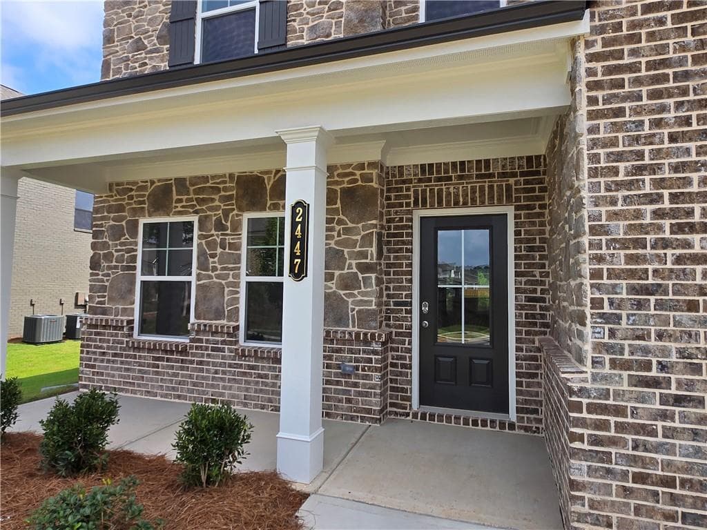 5 bedroom, 3 bathroom, 2,549 sq ft single family residence for sale at 2447 Enchanted Sky Way, Dacula, GA 30019 — photo 4