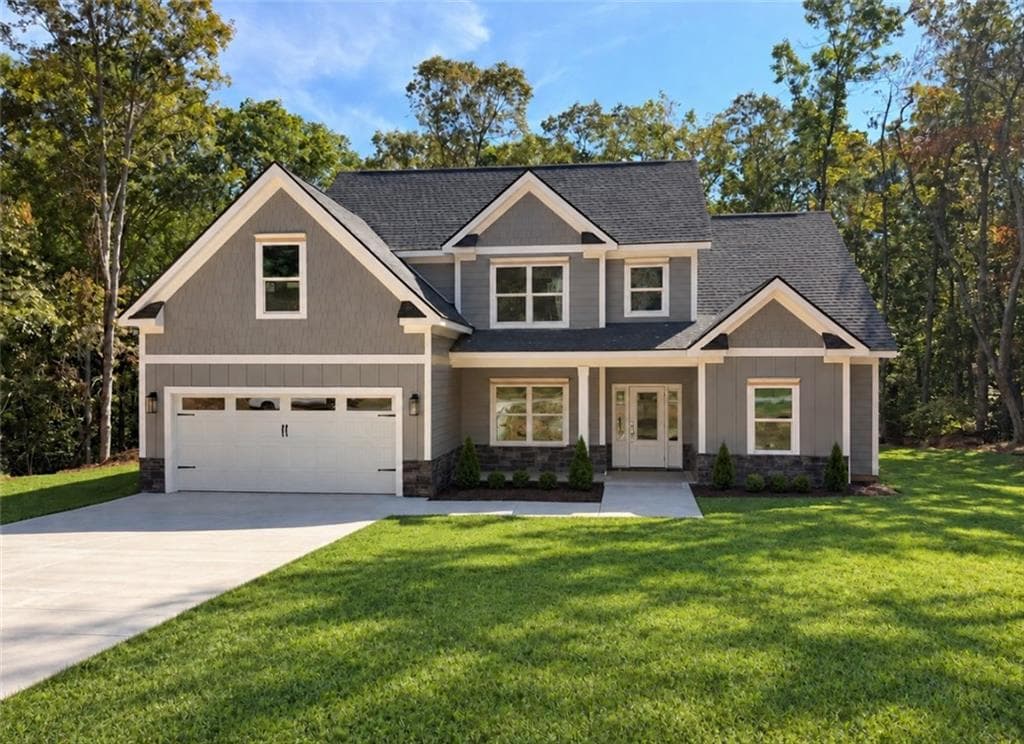 4 bedroom, 3 bathroom, 2,160 sq ft single family residence for sale at 303 Spring Lake Cove, White, GA 30184 — photo 2