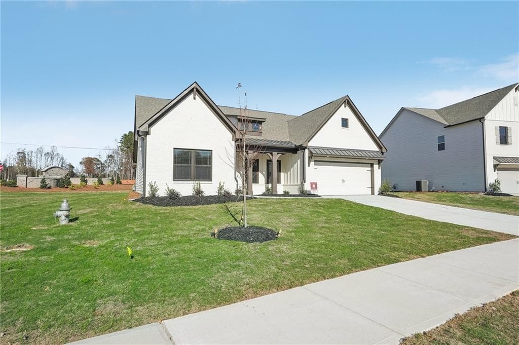 4 bedroom, 4 bathroom, 3,057 sq ft single family residence for sale at 772 Secret Garden Lane, Dacula, GA 30019 — photo 3