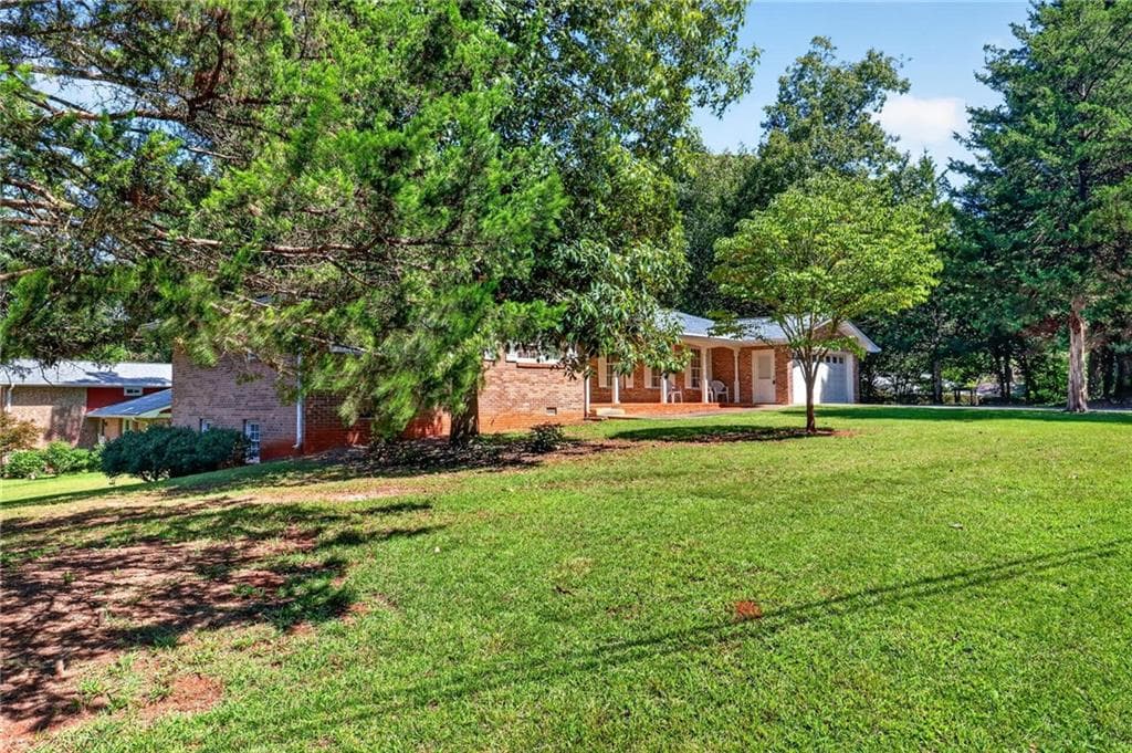 4 bedroom, 3 bathroom, 2,692 sq ft single family residence for sale at 4224 Wheaton Lane, Clarkston, GA 30021 — photo 5