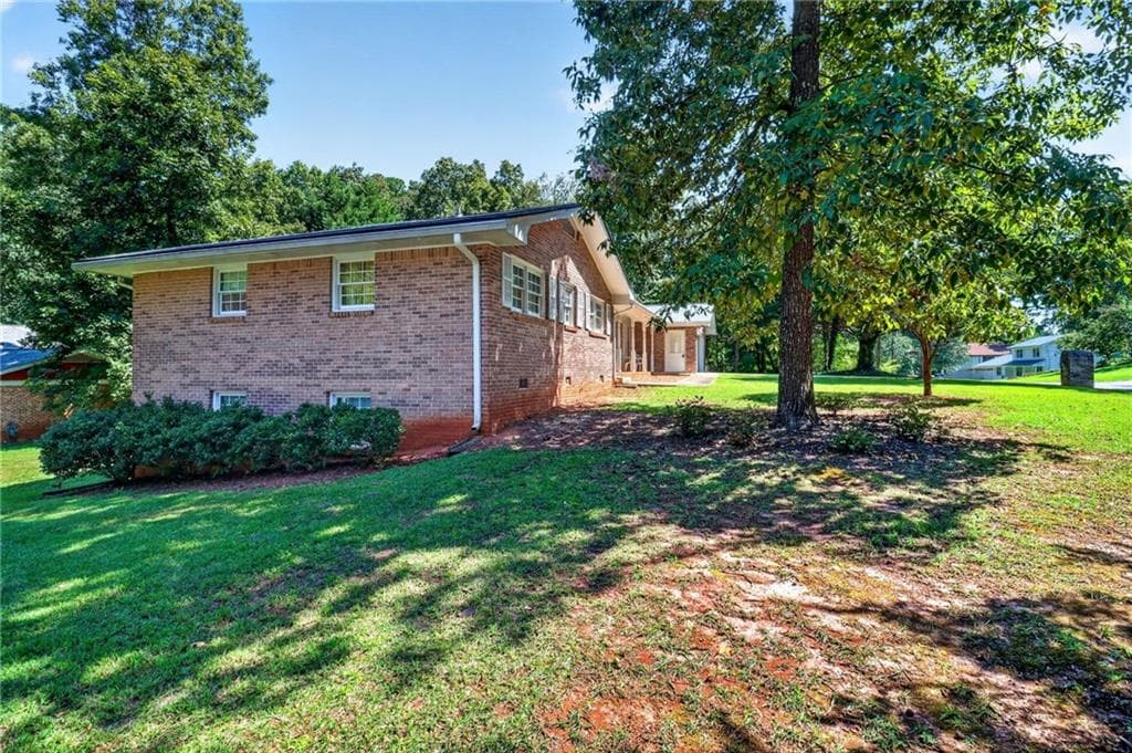 4 bedroom, 3 bathroom, 2,692 sq ft single family residence for sale at 4224 Wheaton Lane, Clarkston, GA 30021 — photo 6