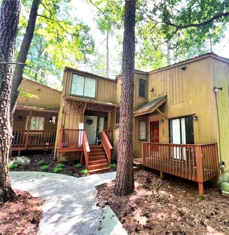 2 bedroom, 2 bathroom, 1,220 sq ft townhouse for sale at 5806 Par Four Court, Lithonia, GA 30038 — photo 1 of 20